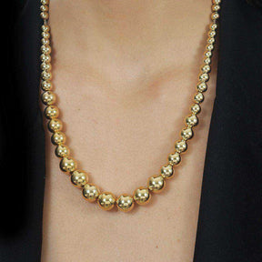 Colar Dourado de Bolas Crescentes - Galeria